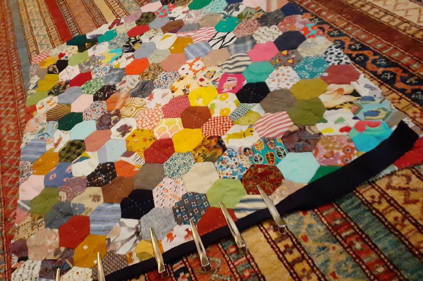 Photo of patchwork quilts and babies