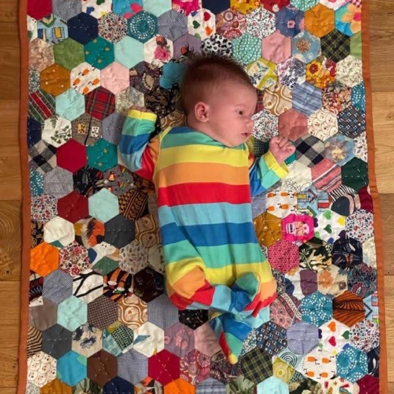 Photo of patchwork quilts and babies